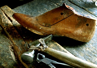 This photo of a shoe form and cobbler's tools shows how it all begins ... and ends up with a perfect pair of shoes.  Photo by Miguel Ugalde of Mexico City.